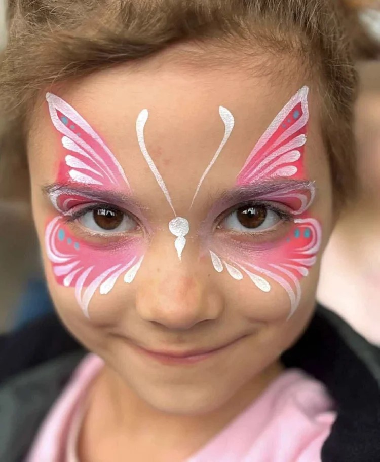 Butterfly face painting design for a kids birthday party in Texas